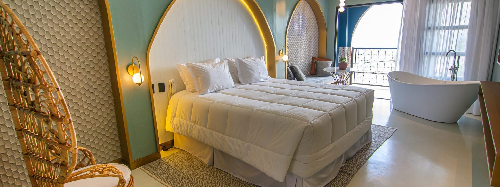 Deluxe Room with Ocean View: Enjoy luxury and comfort in our spacious room with a panoramic ocean view.